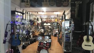 tiendas de guitarras en cancun QuintanaRock