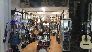 tiendas ukeleles cancun QuintanaRock